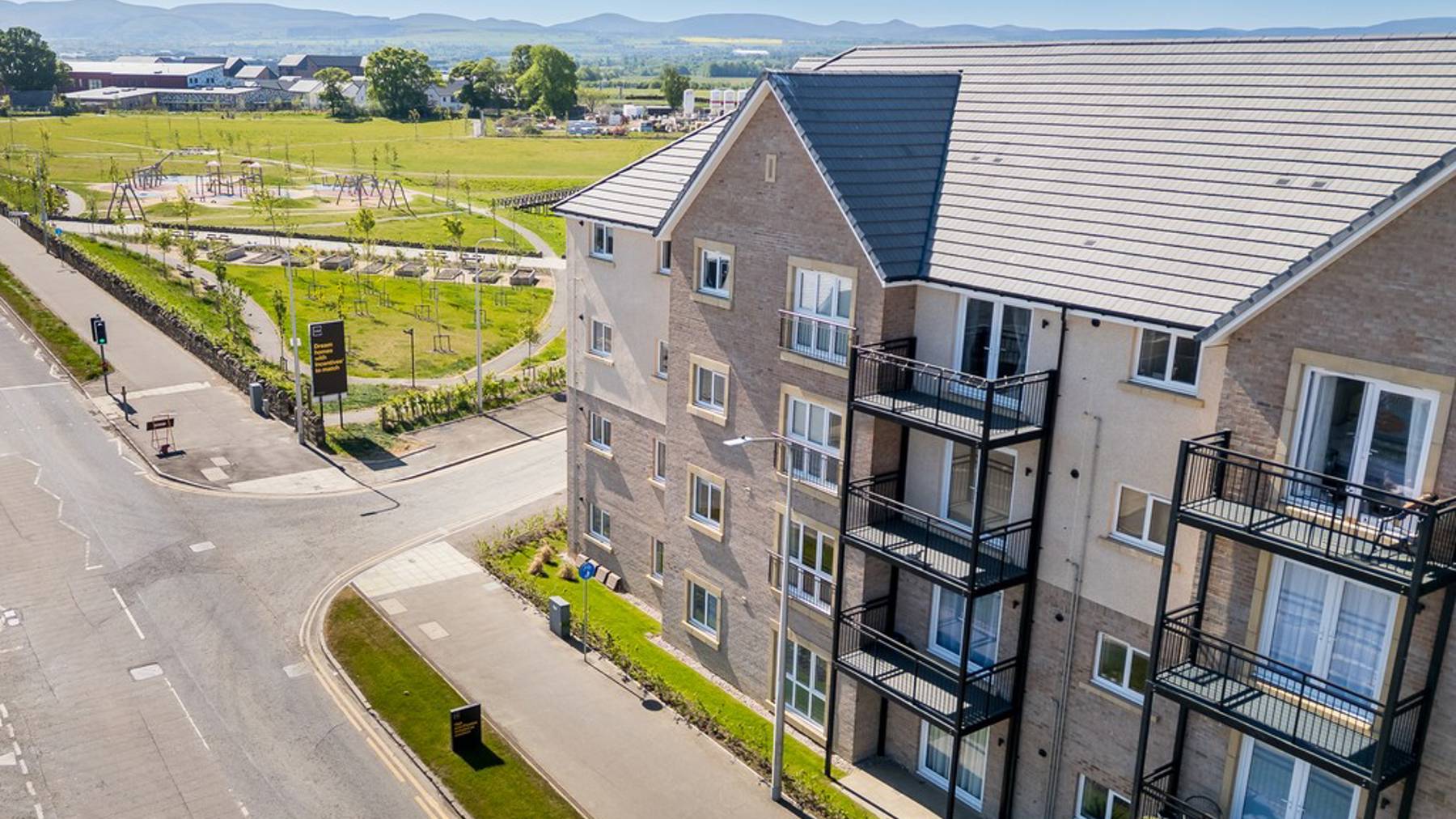 West Craigs, Cala, Edinburgh | street scene | 3, 4 & 5 bedroom houses and 2 & 3 bedroom apartments