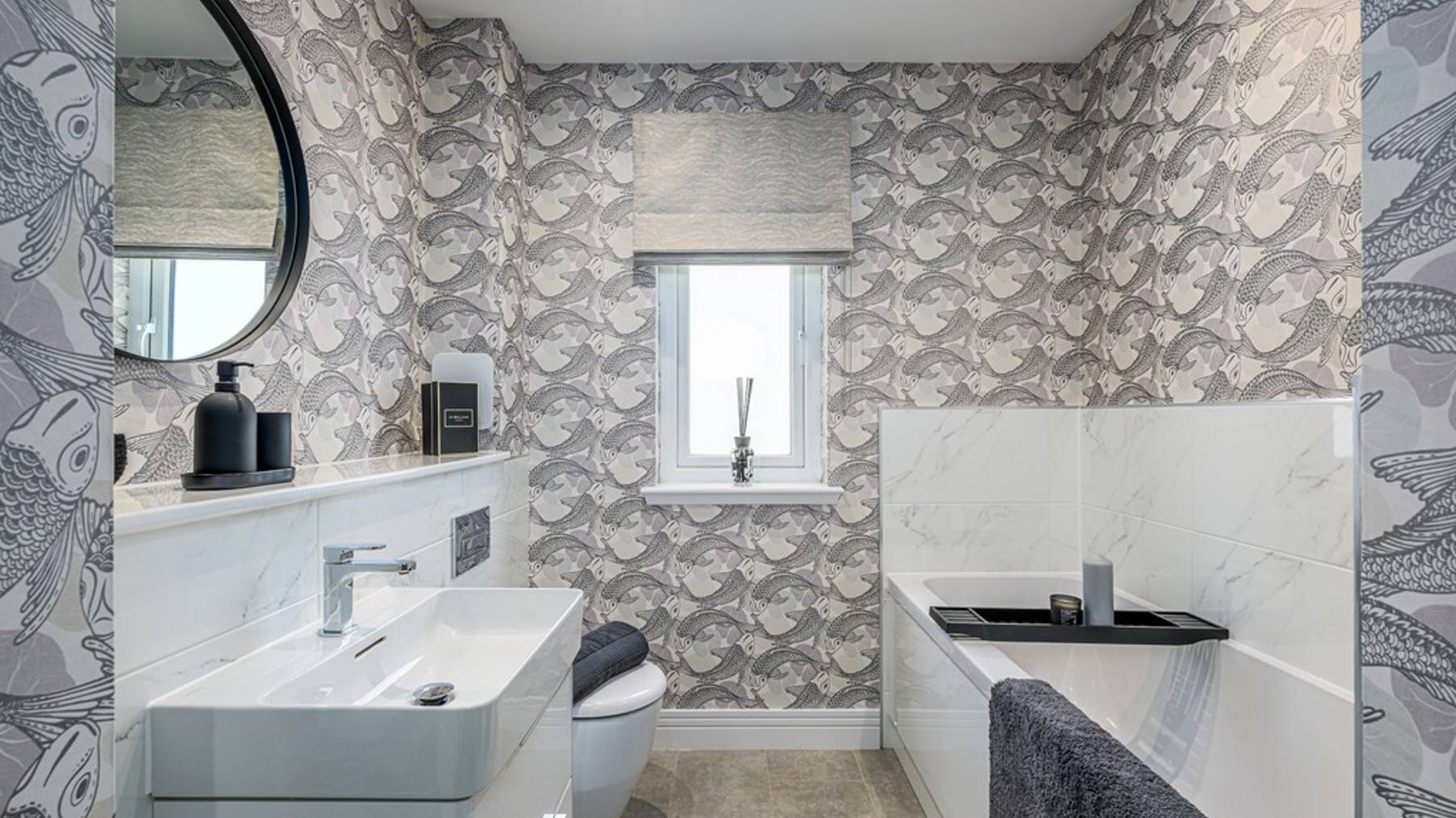 4 bedroom plus study showhome | stylish family bathroom with sleek fittings and half-height tiling