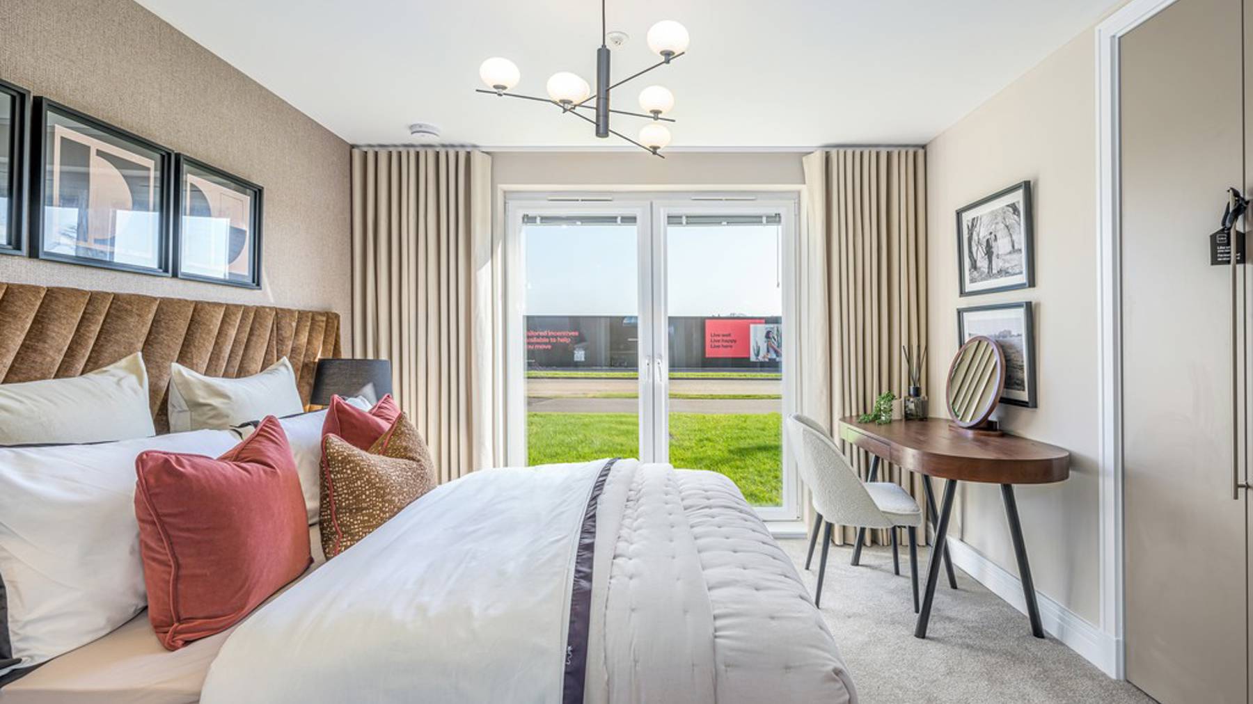 Show apartment | generous bedroom with fitted wardrobes