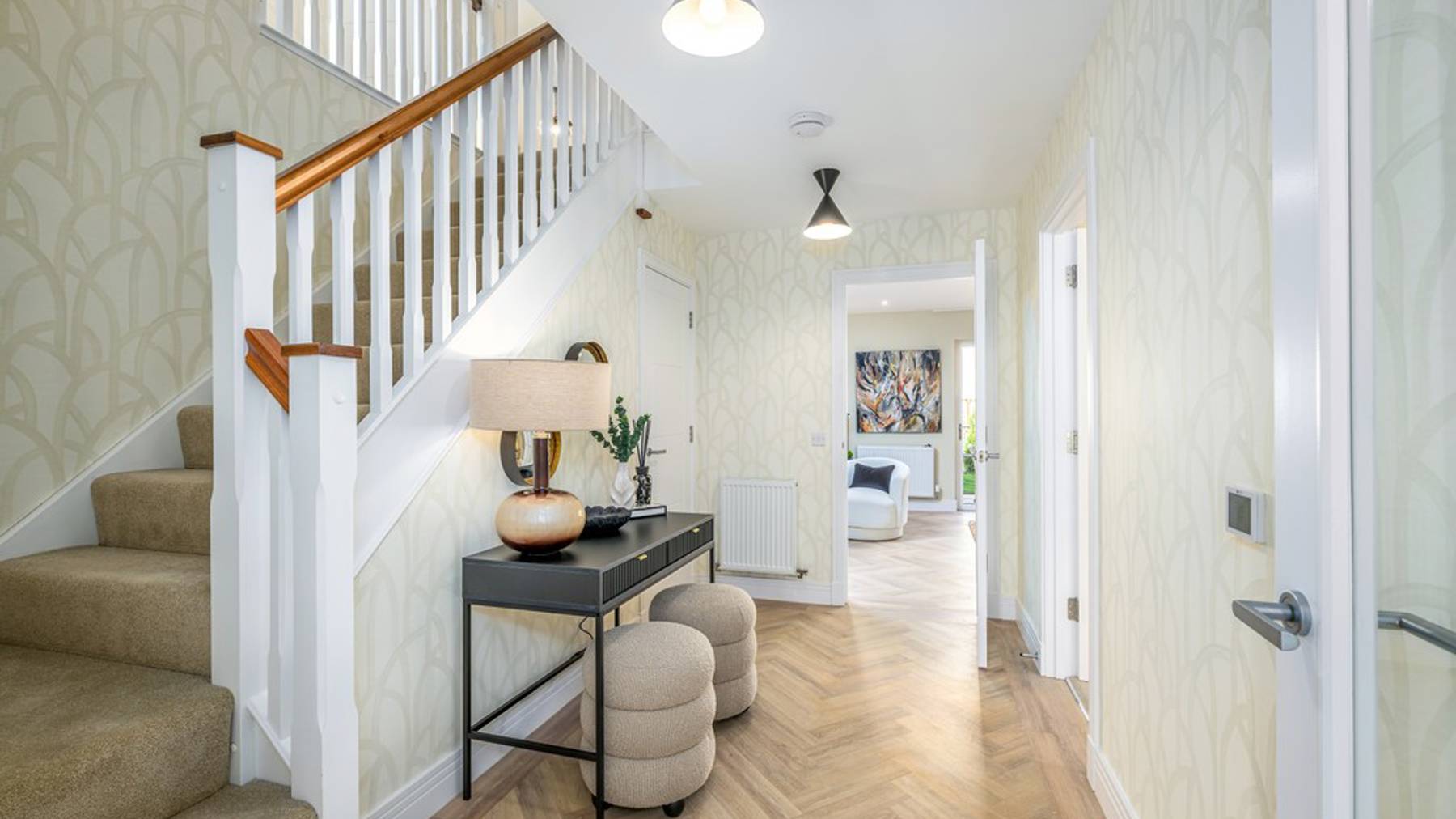 5 bedroom showhome | welcoming entrance leading to spacious hallway with cloakroom and storage