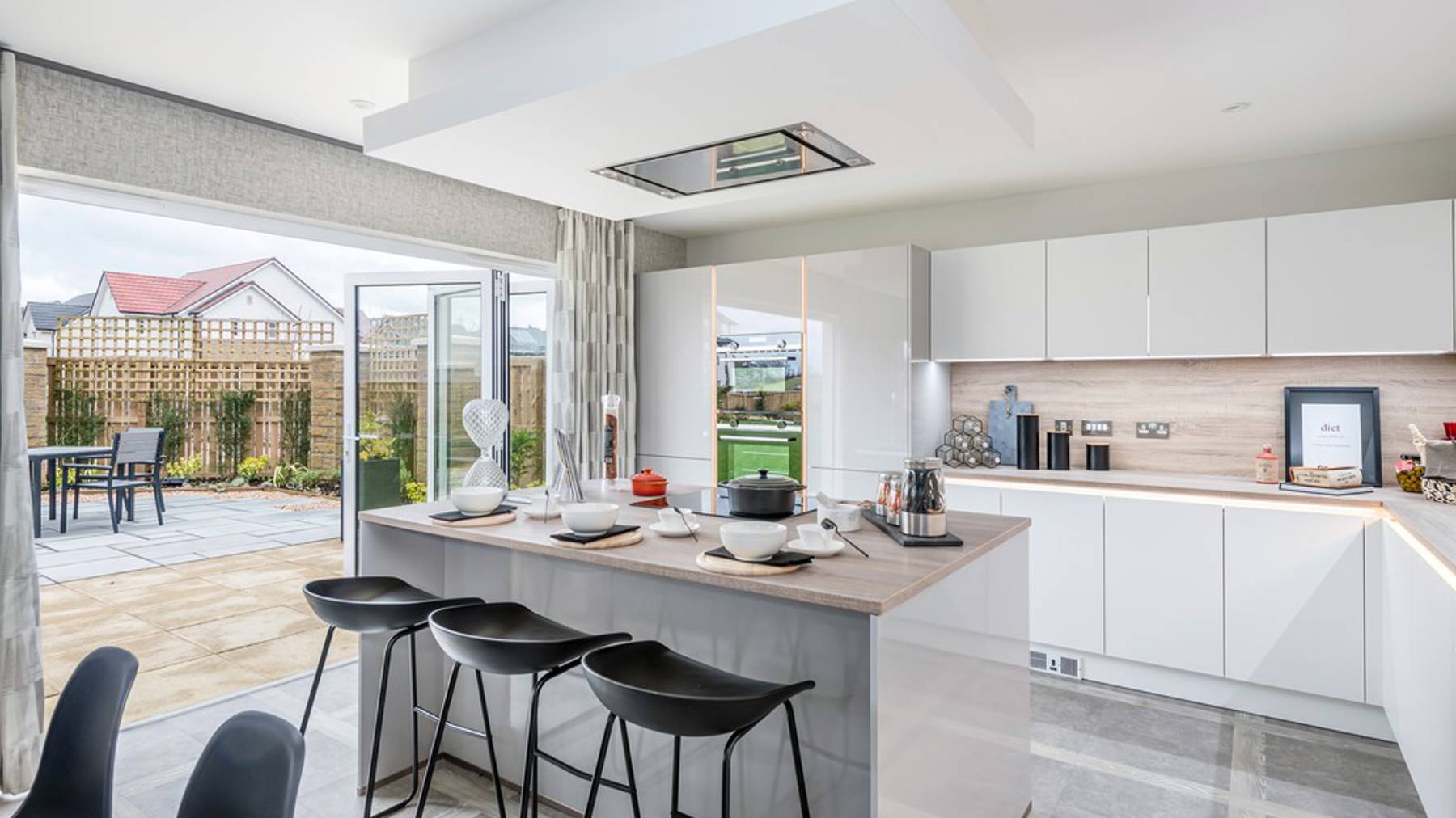 Darroch kitchen with bi-fold doors and island 