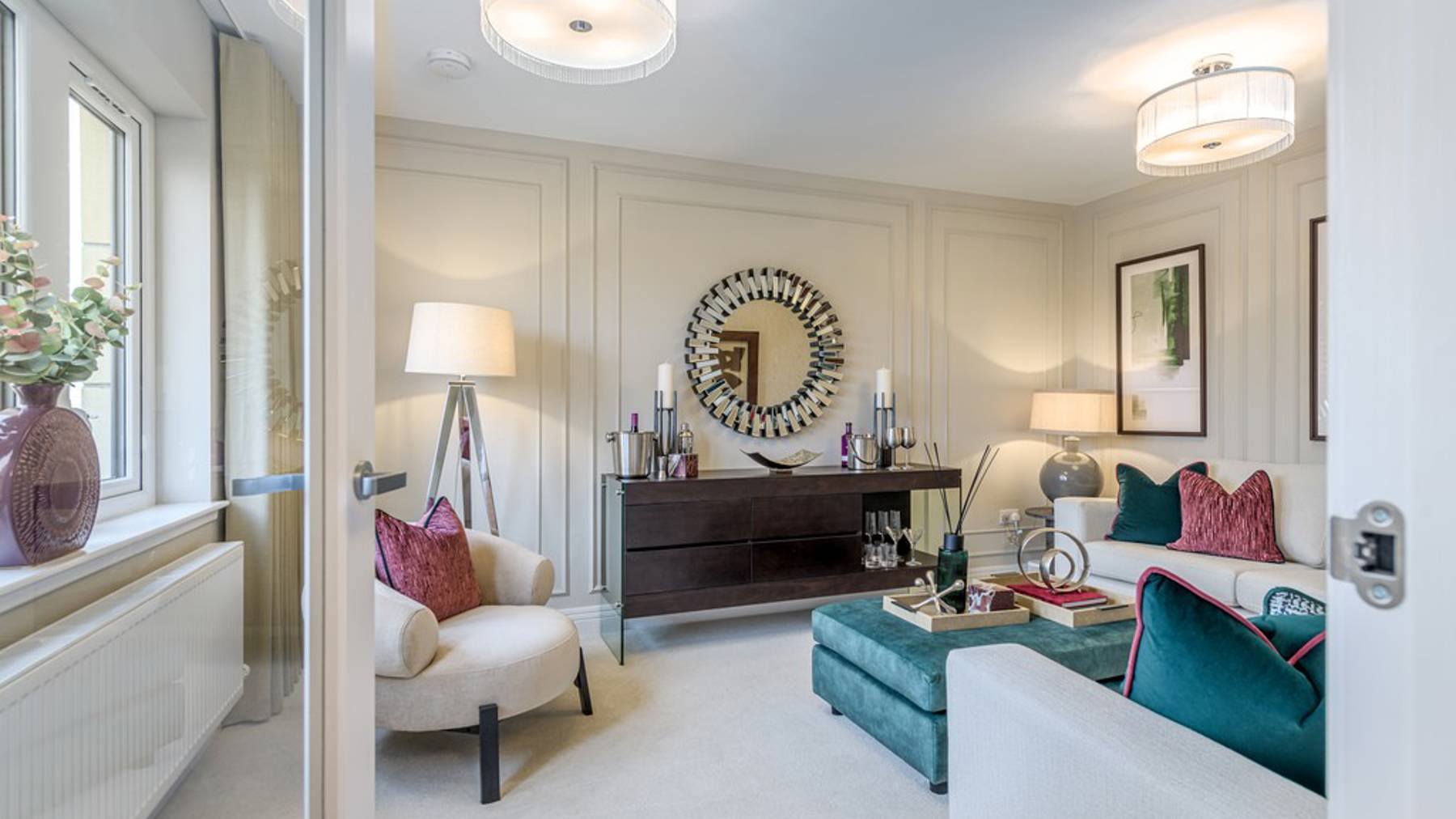 4 bedroom showhome | formal lounge with front-facing windows and elegant neutral décor